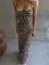 Сукня в леопардовий принтом зі спокусливими високими розрізами
