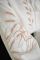 Белая женская вышитая рубашка с нежным растительным орнаментом