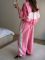 Стильный и практичный костюм из высококачественной плащевки розового цвета